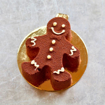 Gingerbread Man with milk chocolate mousse and gingerbread insert, coated in milk chocolate