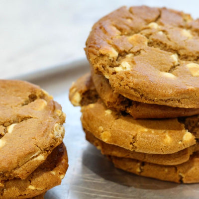 Artisan Ginger & White Chocolate Cookies piled high, perfect for sharing or gifting.